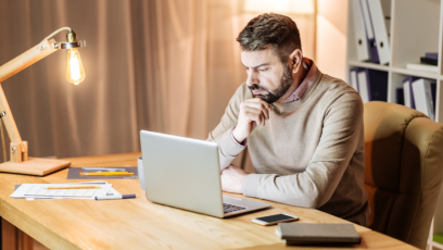 Male professional working on laptop