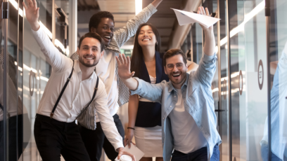Happy group of employees cheering